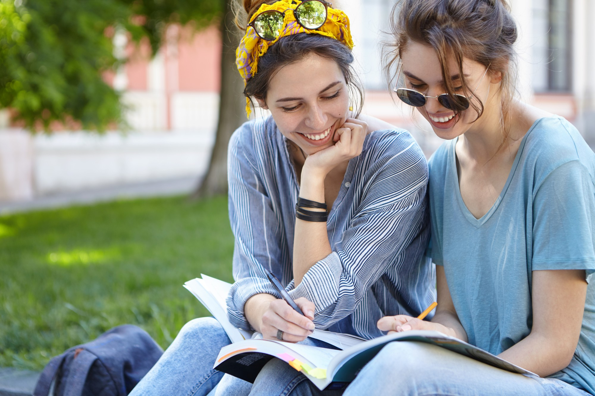 2 girls studing in summer